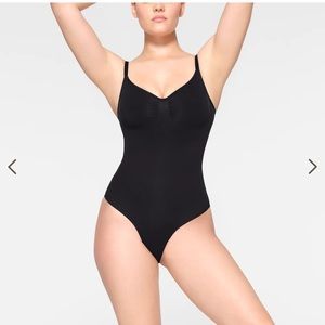 Skims seamless sculpt brief bodysuit in ONYX